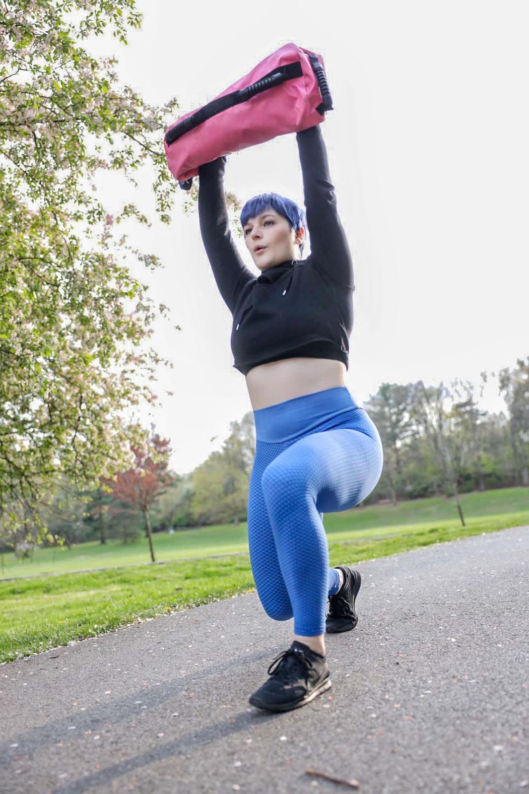 Rachel demonstrating a loaded lunge outdoors